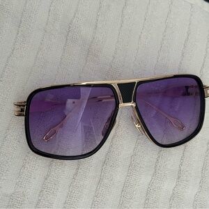 Gobiger Men’s Stylish Purple Sunglasses with a Gold Frame and Carrying Case